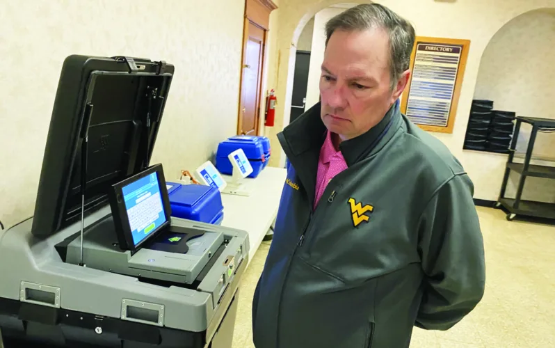Picture This: Couch inspects election equipment